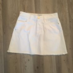 White Frame Denim Skirt Size 25 Has Two Pockets In Front And Back With A Zipper And Gold Button In Front And Small Fringing On Hem Of Skirt. New Without Tags Due To Dry Cleaning White Denim Skirt Outfit, White Denim Skirt, Denim Skirts, Frame Denim, White Denim, White Frame, Denim Skirt, Womens Skirt, Zipper