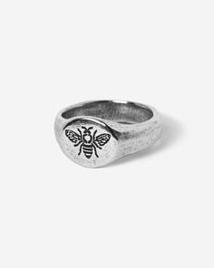 SILVER ∙ BEE ∙ R I N G Our unique, sterling silver rings are hand sculpted in wax and brought to life in solid 925 sterling silver. We then finish the design with oxidisation by hand giving each ring a personalised look. A ring symbolising the importance to always 'Bee There' for your mates. For every 'Bee There' ring sold, 20% of the profits are donated directly to Lifeline, a national charity providing 24/7 crisis support to individuals experiencing emotional distress. Inspired by immersive tr Bee Ring, Sterling Silver Mens, Ring Sizer, Unisex Jewelry, Silver Rings Handmade, Engraved Rings, 30 Seconds, Ring Sterling Silver, Ring Handmade