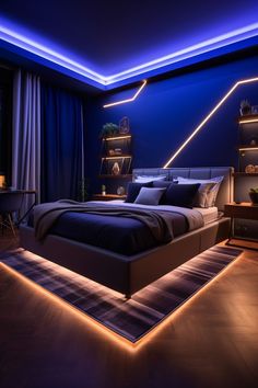 a large bed sitting under a blue light in a bedroom