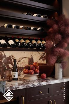 Home wine bar in a rich warm brown colour that creates the ambiance of a perfect glass of red. Warm Wine, Veined Marble, Marble Home, Red Marble, Bottle Display, Luxurious Home, Marble Countertops, Wine Bar