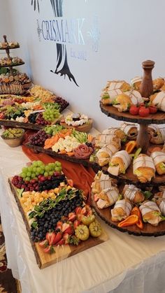 an assortment of food is displayed on a table