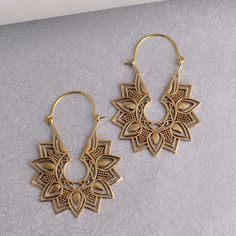 "Lotus Earrings, Brass Hoop Earrings, Boho Earrings, Yoga Earrings, Meditation Jewelry, Flower Earrings, Spiritual Earrings, Mandala Earrings Handmade Earrings Material:- Brass This gold mandala earrings is lightweight and adjustable to fit any ear! We found this piece while traveling across the tribal deserts in India. Indian tribal jewelry is known for being unique, detailed and high quality. IMPORTANT NOTE....👇 1 product free gift on purchase of 3 products. You can choose the plain brass rin Spiritual Earrings, Yoga Earrings, Mandala Earrings, Lotus Earrings, Gold Mandala, Brass Hoop Earrings, Jewelry Flower, Brass Hoops, Earrings Boho