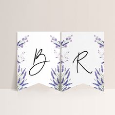 two cards with the letters b and r on them