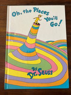 a children's book about dr seuss on the place you go with an image of a colorful cone