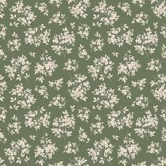 a green and white floral wallpaper with small flowers on the bottom half of it