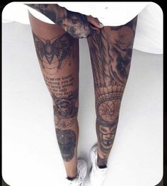 a woman's legs with tattoos on them