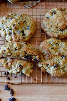 cookies cooling on a wire rack with raisins