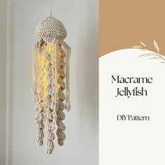 a crocheted light hanging from the ceiling next to a sign that reads, macrame jellyfish diy pattern