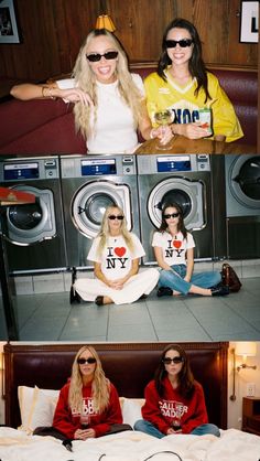 two women sitting on top of a bed next to each other in front of washing machines