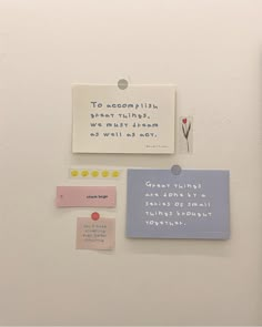 a refrigerator with magnets and notes attached to it