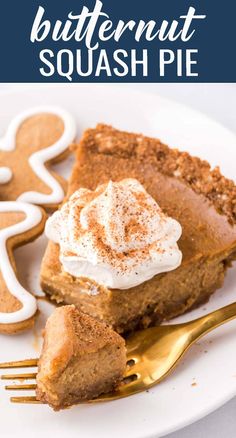 a slice of butternut squash pie on a white plate with gold fork and ginger cookies