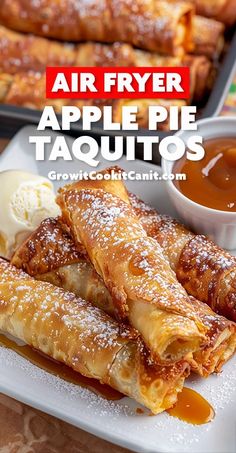 an air fryer apple pie taquitos on a white plate with ice cream and sauce