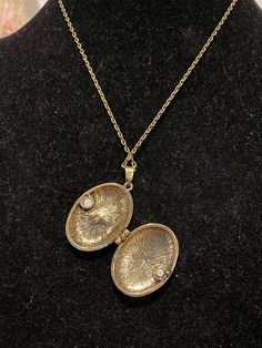 Necklace is antique bronze in color Measures 18 inches in length Pendant measures 2 inches in length and 1 inch in width Small Gift Bags, Cameo Pendant, Locket Necklace, Pendant Earrings, Antique Bronze, Locket, Small Gifts, Gift Bag, May 2024