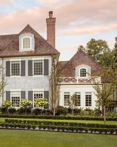 a large white house with lots of windows