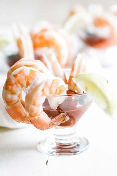 shrimp cocktail in a martini glass garnished with lime