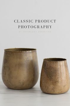 two gold vases sitting next to each other on a white surface with the words classic product photography above them