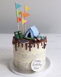 a birthday cake with an assortment of items on it