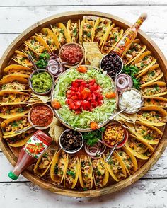 a platter filled with lots of different types of food