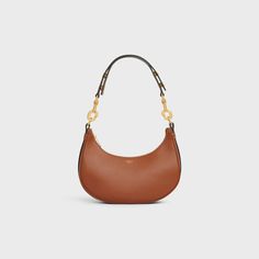 Medium Ava Strap Bag in smooth Calfskin - Tan | CELINE Celine Ava, Fragrance Bottle, Strap Bag, New Sneakers, Small Leather Goods, Chain Bags, Bag Straps, Luxury Handbags, Belt Bag