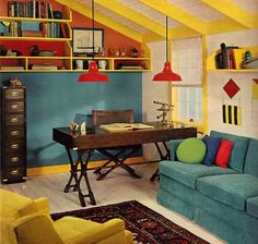 a living room filled with furniture and lots of books