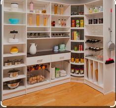 an organized pantry with lots of food in it