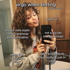 a woman taking a selfie in front of a mirror with text describing the features of her phone