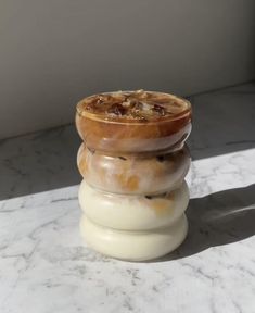 a candle sitting on top of a white table