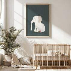 an elephant print hangs above a crib in a white room with a potted plant