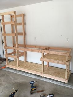 the shelves are being built and ready to be installed in the garage or office area