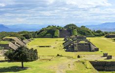 an aerial view of the ancient city of tempish in mexico with mountains in the background