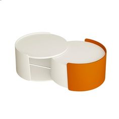 an orange and white object is shown on a white background, with the lid open