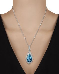 The incredible aquamarine draped from this necklace captures attention with a vibrant aqua hue that rivals that of the world's oceans. Weighing approximately 60.00 carats, the gem's graceful pear shape gives the impression of a drop of water about to drip from its diamond-encrusted platinum setting. The gemstone possesses the deeply saturated Santa Maria blue hue found only in the rarest variety of these stones. Named in honor of Santa Maria de Itabira, the mine in Brazil where they were first d Luxury Light Blue Fine Jewelry Necklace, Luxury Diamond Cut Blue Topaz Necklace, Luxury Aquamarine Necklace In Fine Jewelry Style, Luxury Aquamarine Wedding Necklaces, Luxury Light Blue Pendant Necklace, Luxury Modern Sapphire Necklace, Luxury Aquamarine Necklace With Diamond Accents, Aqua Marine Silver Necklace, Blue Aquamarine Pendant Necklace