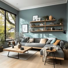 a living room filled with furniture and lots of window sill mounted on the wall