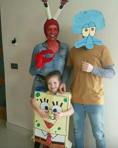 two people and a child are dressed up as spongebob and patrick the plat