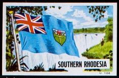 a postage stamp with an image of the british and canadian flags on it's side