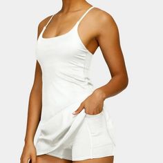 Halara Cloudful White Cross Back Active Wannabe Dress With Attached Shorts. Shorts Have Pockets. Built In Shelf Bra With Removable Foam Pads. New With Tag. Women's Size Small(4-6). Bust Is 30" Relaxed And 40" Stretched. Hip Of Attached Shorts Is 32" And Stretches To 46". Shorts Have 3 3/4" Inseam. Length From Underarm To Bottom Hem Is 22". Smoke Free, Pet Free Home. Ballet Dance Dress, Skort Dress, Flowy Mini Dress, Golf Dresses, Athletic Dress, Tiered Ruffle Dress, Venus Dresses, White Cross, Corset Mini Dress