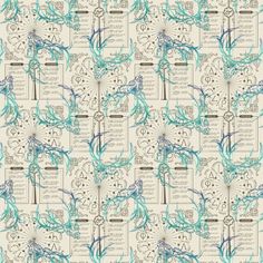 a blue and white wallpaper with an abstract design