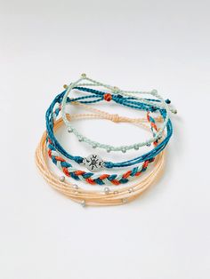 These fun bracelets are waterproof and great for anyone who is often doing outdoor activities. They would make a nice gift. Stack these together, with other bracelets, or wear them by themselves! They are perfect for everyday wear! ∙ ∙ ∙ ∙ ∙ ∙ ∙ ∙ ∙ ∙ ∙ ∙ ◆ PLEASE NOTE ◆ When you first receive these bracelets they may be slightly sticky, which may make them more difficult to adjust. The stickiness does not last. After a day or two of wearing the stickiness will fade and it will be much easier to Casual Adjustable Bracelets For Outdoor Wear, Adjustable Casual Bracelet For Outdoor Activities, Casual Adjustable Bracelets For Outdoor Activities, Casual Adjustable Bracelet For Outdoor Activities, Resizable Waxed Cord Friendship Bracelets For Beach, Adjustable Blue Bracelets For Outdoor, Pura Vida Bracelets Stacked, Pura Vida Bracelets Bead, Adjustable Ocean-inspired Friendship Bracelets For Beach Season