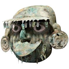 an odd looking mask with large eyes and spikes on it's head is shown against a white background