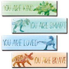 three wooden signs with dinosaurs on them and the words you are kind of smart, you are smart, you are smart