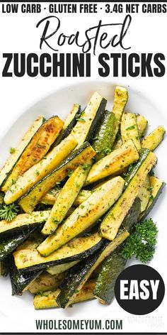 grilled zucchini on a white plate with parsley in the middle and text overlay that reads, oven roasted zucchini