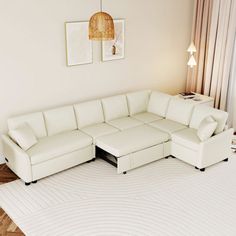 a living room with a white sectional couch