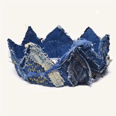 This crown  from Textiles from Reworked Denim Jeans is perfect for those moments when you feel like royalty and want to embrace it delicately, with a touch of elegance. Handmade hair accessories made from a mix of various blue denim scraps and other reused materials, it is not only a unique head accessory but also a symbol of eco-friendly fashion. The crown features intricate Boro Hand-Stitched Sashiko embroidery, blending traditional craftsmanship with a modern ecological approach. This unique Headband Crown attracts attention; it is meticulously handmade, truly one of a kind, and capable of adding a bold and stylish touch to any outfit. Entirely handcrafted, with approximately 12 hours of careful workmanship, this piece is truly one-of-a-kind. Materials: Denim, cotton, gold bright sequin Reworked Denim Jeans, Mask Craft, Denim Headband, Boro Sashiko, Reused Materials, Jean Fashion, Textiles Art, Denim Scraps, Unique Headband