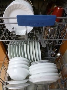 the dishes are in the dishwasher and ready to be washed