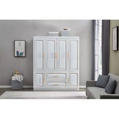 a white armoire in a living room