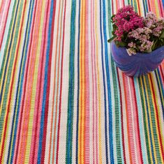 The Bright Stripe Handwoven Indoor/Outdoor Custom Rug is a funfreshand colorful indoor/outdoor rugThis rug is lightweightdurableand washablemaking it the perfect solution for high-traffic areas such as kitchensmudroomsfamily roomsplayroomsor patios. Bright Stripes, Store Design Interior, Indoor Outdoor Rug, Family Rooms, Store Interior, Outdoor Rug, Interior Design Services, Instagram Shop