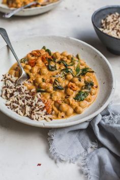 a white bowl filled with rice and beans