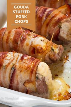 bacon wrapped stuffed pork skewers in a white casserole dish with text overlay that reads, goula stuffed pork chops