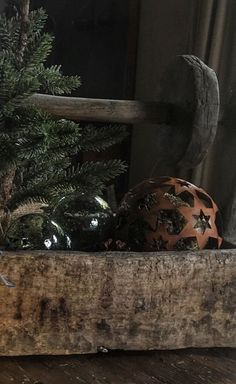 a potted plant sitting on top of a wooden table next to a window sill