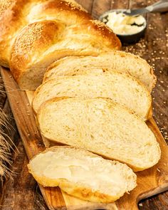 sliced bread and butter on a cutting board